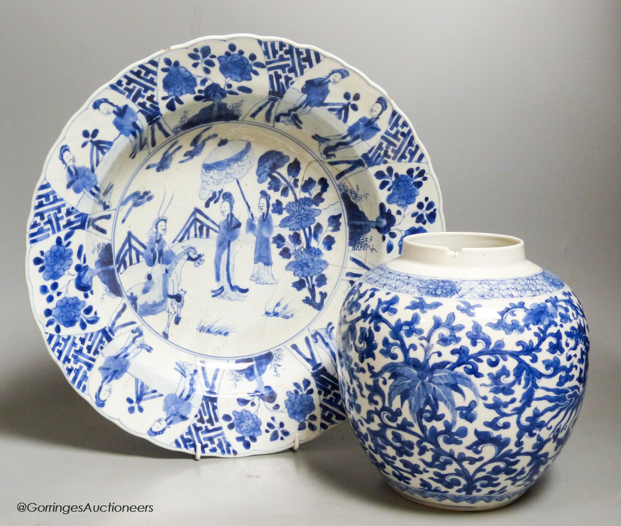 A Chinese blue and white dish, Kangxi mark and of the period, diameter 34cm, and a 19th century