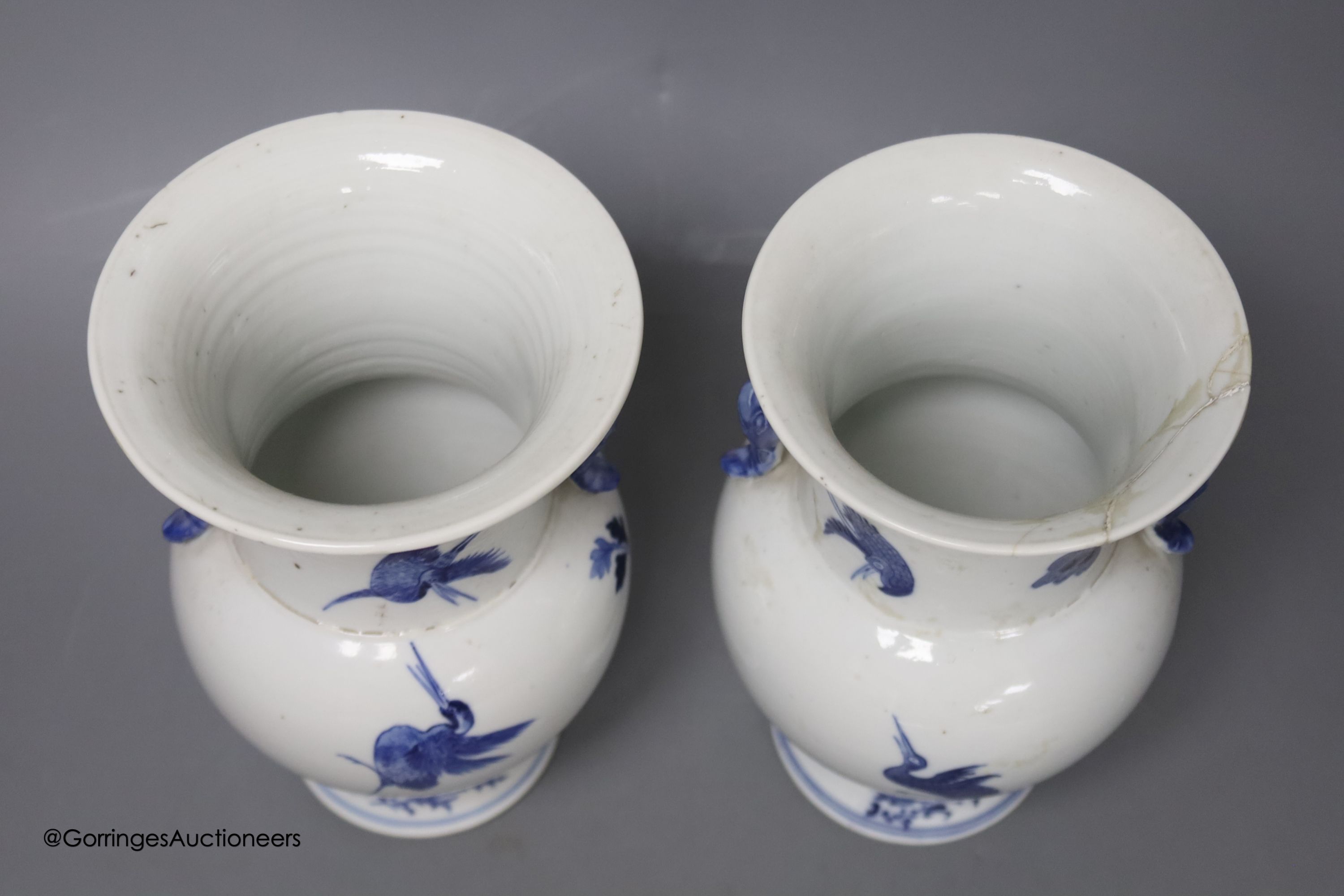 A pair of Chinese blue and white 'phoenix' vases, Kangxi marks but late 19th century, height 20cm ( - Image 3 of 4