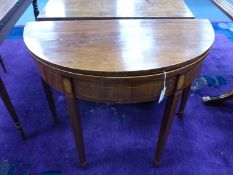 A George III inlaid demi lune folding tea table, width 93cm, depth 46cm, height 73cm