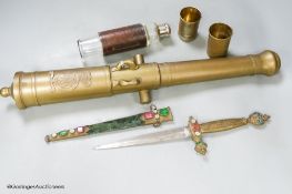 A bronze model cannon barrel, a dagger and a leather cased 'toddy' bottle