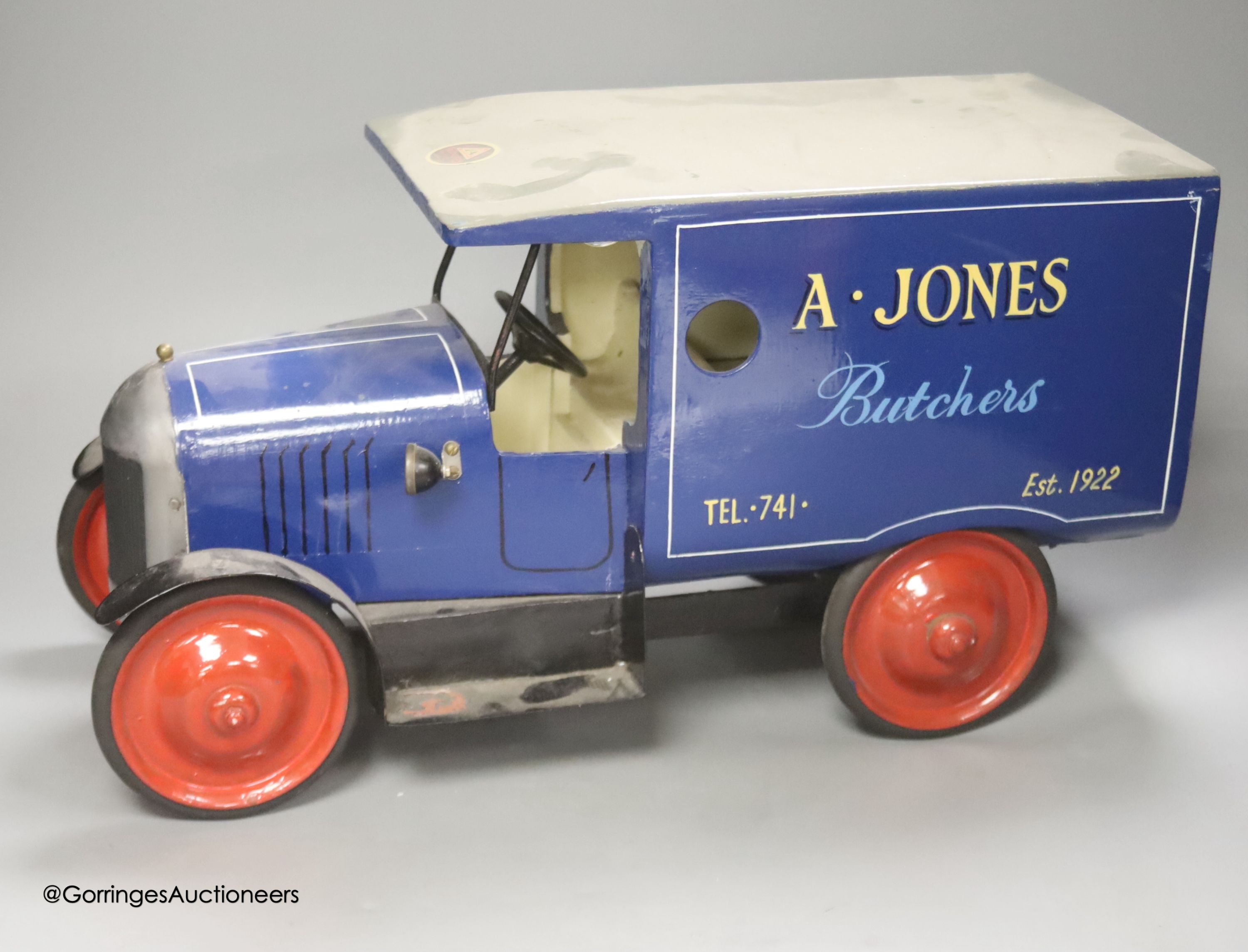 An A. Jones Butcher's painted metal model of a van, length 47cm height 25cm