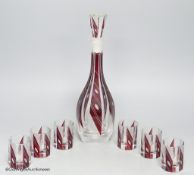 A Bohemian Art Deco ruby flash glass seven piece liqueur set, decanter 32cm