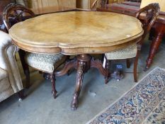 A Victorian figured walnut shaped oval tilt topped loo table, width 134cm, depth 102cm, height 73cm