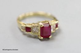 A modern 14k, ruby and graduated ruby and diamond set seven stone half hoop ring, size N, gross 3.6