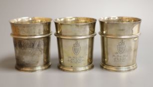 A set of three George V silver beakers, by Edward Barnard & Sons, London, 1929,with engraved