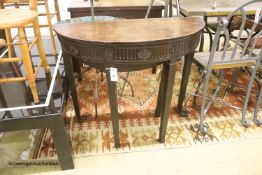 A George III mahogany 'D' shaped drop flap tea table, fitted with one drawer, width 88cm, depth