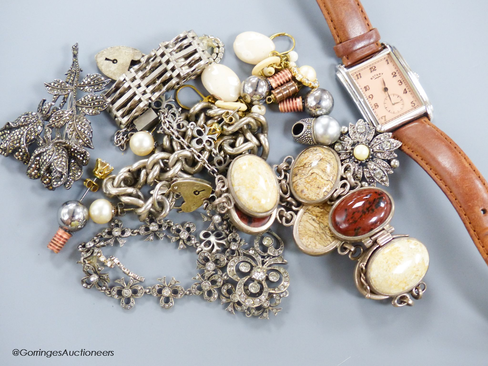 A silver curblink bracelet, a paste set necklace, a gentleman's steel Rotary quartz wrist watch,