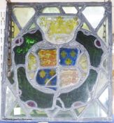 A leaded and stained glass panel, decorated centrally with armorial shield , 39 x 45cm