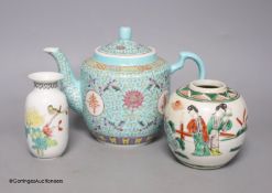 A Chinese turquoise ground teapot, 15.5cm high, a famille verte jar and a famille rose vase (3)