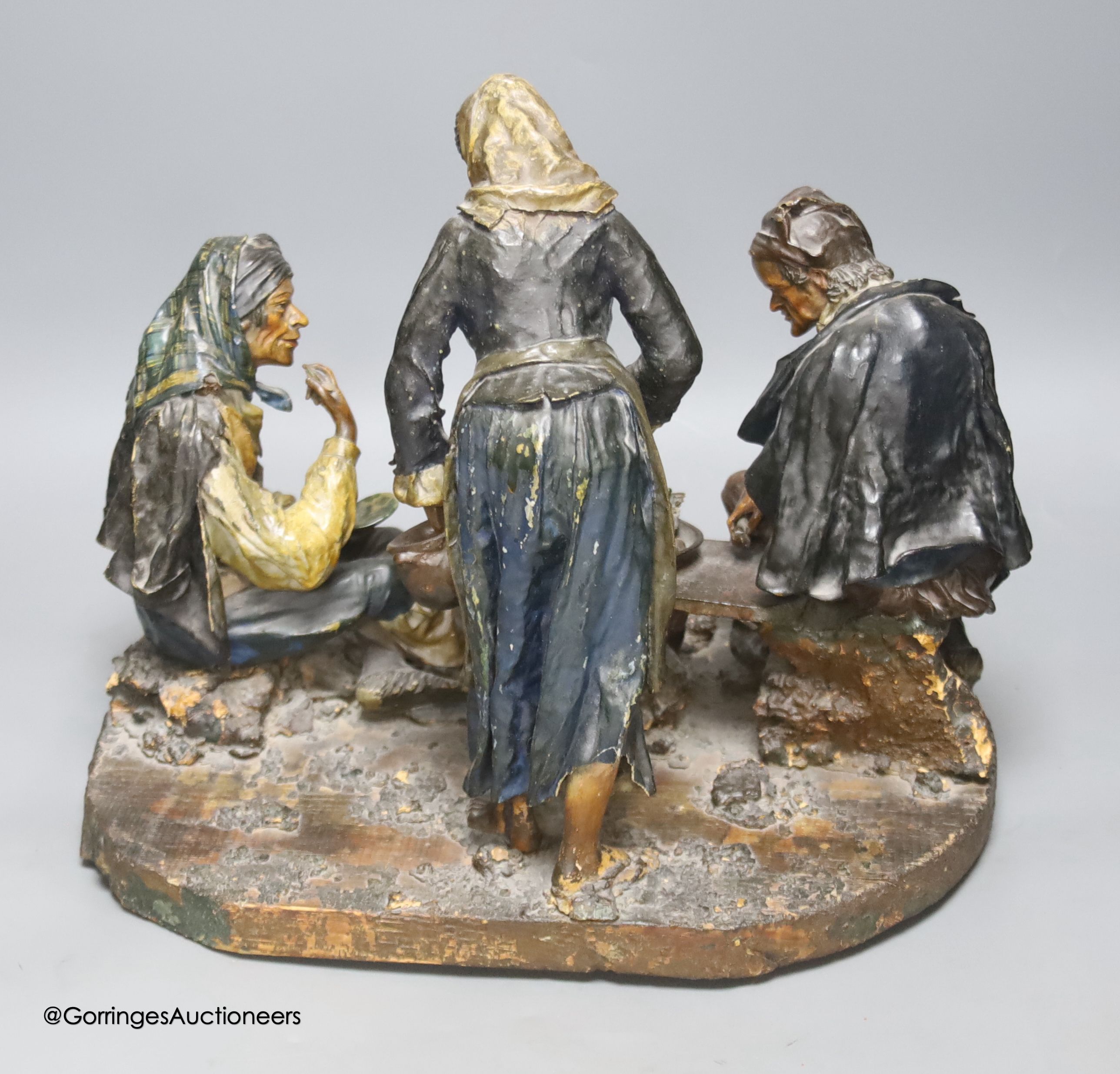 A continental worked leather figure group of two gentleman and a lady, width 87cm - Image 2 of 4