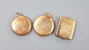 Three early 20th century yellow metal lockets, one stamped 9ct gold, all with engraved name or