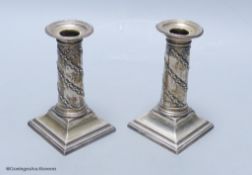 A matched pair of late Victorian silver dwarf candlesticks, Hawksworth, Eyre & Co, Sheffield,
