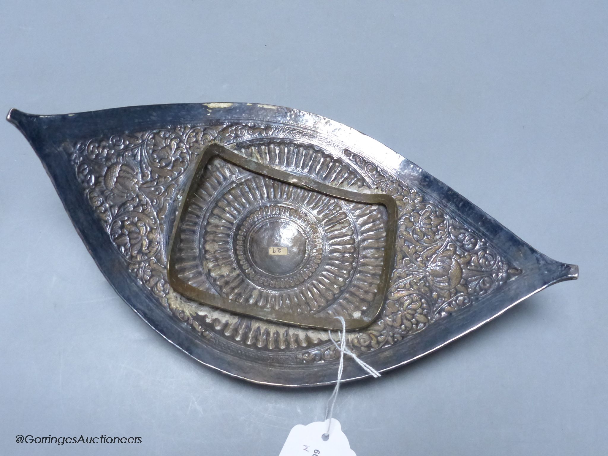 A Chinese Straits large white metal belt buckle, of curved navette form,having embossed foliate - Image 2 of 2