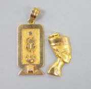 Two Egyptian gold charms (tested as 18ct), gross 6.3 grams.