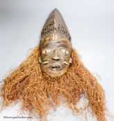 A Bapende tribal carved wood mask, 41cm high