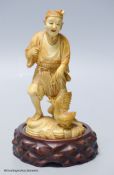 A Japanese ivory figure of a cormorant fisherman, early 20th century