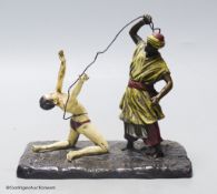 Attributed to Franz Bergmann, a cold painted bronze model of a slave trader, whipping a nude slave,