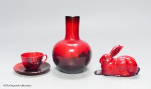 Royal Doulton flambe ware, consisting: a vase, a cup and saucer and a model of a hare (4)