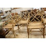 Nine caned bamboo elbow chairs