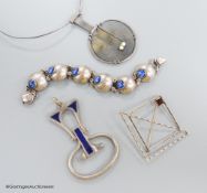 A stylish 1970's silver and blue enamel set pendant, maker E&N?, 78mm, gross 45.2 grams, a