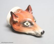An early 19th century English porcelain 'Tally Ho' fox head stirrup cup, length 11cm