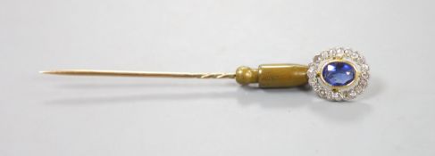 An early 20th century yellow metal, sapphire and diamond set oval cluster stick pin, 72mm, gross