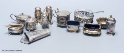 A collection of silver condiments and other items,including a pair of octagonal peppers, two other