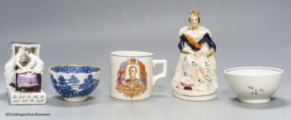 A German porcelain fairing - ' Last in bed', a famille rose tea bowl and three other pieces