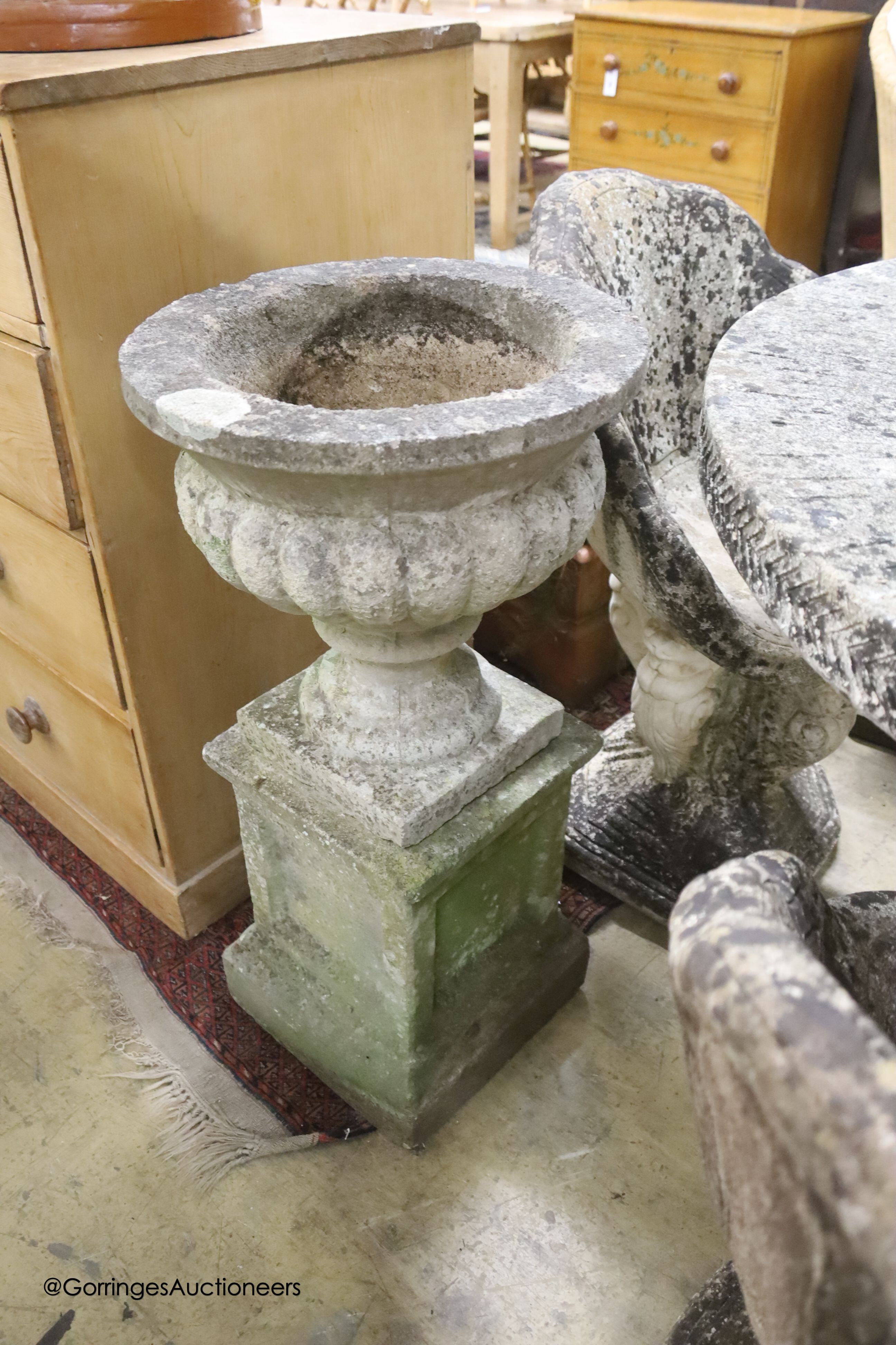 A circular reconstituted stone circular garden table, diameter 114cm, height 79cm and four matching - Image 4 of 4