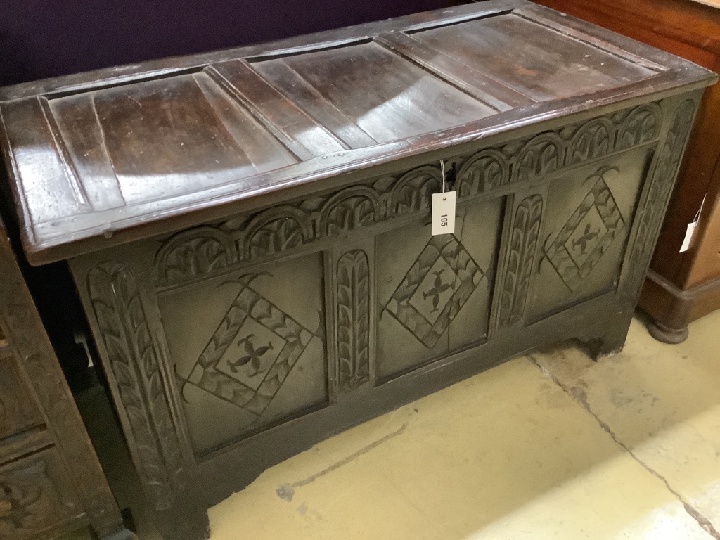 A late 17th / early 18th century carved panelled oak coffer, width 110cm depth 55cm height 65cm