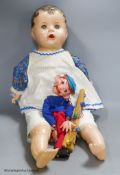 A Pelham puppet and a large Canadian composition doll, 59cm high.