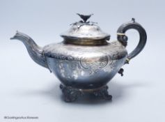 A late William IV embossed silver squat melon shaped teapot, by The Barnards, London, 1837, gross