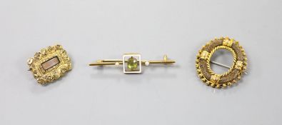A George III gold plated mourning brooch, 20mm, a 19th century yellow metal and plaited hair