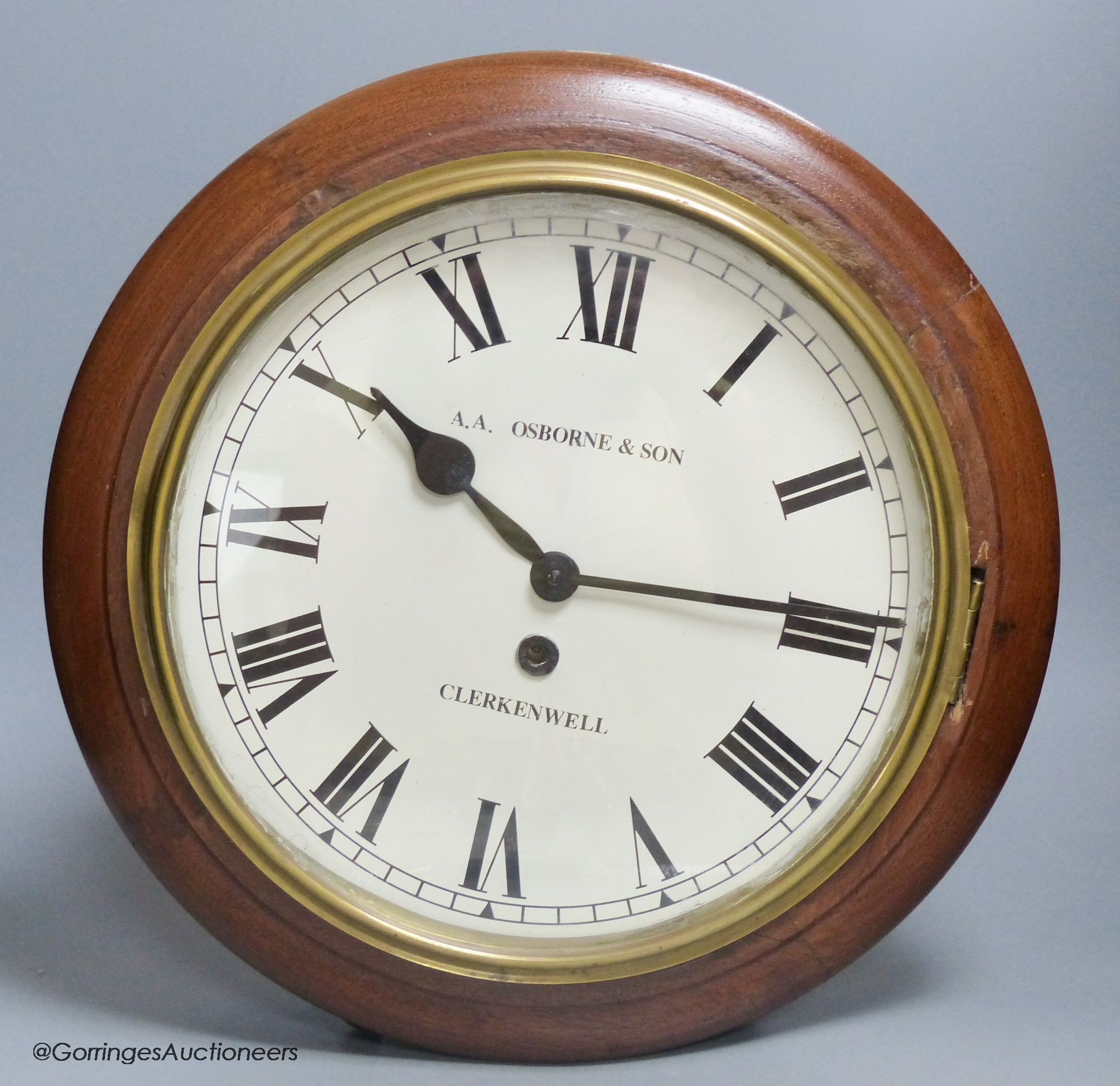 An early 20th century mahogany cased wall clock, A.A. Osborne & Son, diameter 40cm