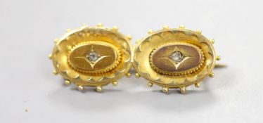 A Victorian yellow metal and rose cut diamond set 'double oval' brooch (adapted stick pins), 34mm,