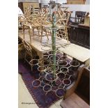 A Victorian style painted wrought iron pot stand, height 170cm