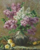 An early 20th century Continental still life study with flowers, oil on canvas, indistinctly