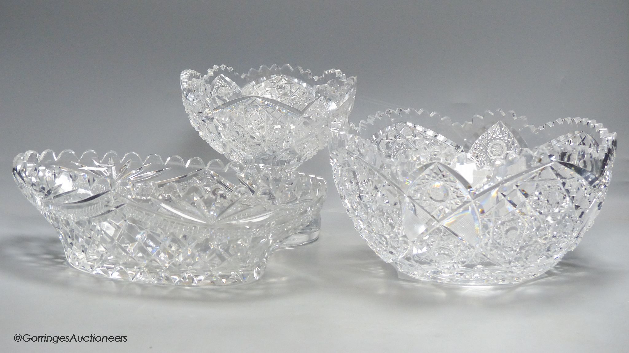 A Waterford style cut crystal bowl and stand and an oval cut glass bowl, 31cm
