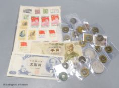 A collection of Chinese coins, stamps and two Japanese banknotes