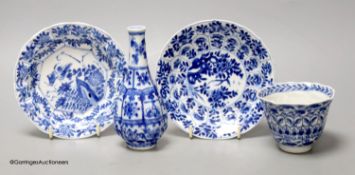 A Chinese blue and white plate 13cm diameter, a similar tea bowl and saucer, Kangxi period and a