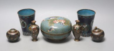 A Chinese cloisonne enamel box & cover, two beakers and four similar Japanese miniature vessels