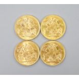 Four George V gold sovereigns, 1912, 1917, 1928 and 1930