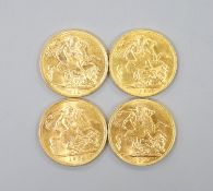 Four George V gold sovereigns, 1912, 1917, 1928 and 1930