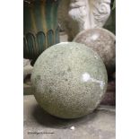 A pair of reconstituted stone spherical garden ornaments, height 24cm