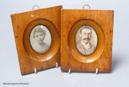 A pair of Victorian light beech photograph frames (with portrait photographs)