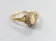 An early 20th century Austro Hungarian? yellow metal, opal and rose cut diamond set oval dress