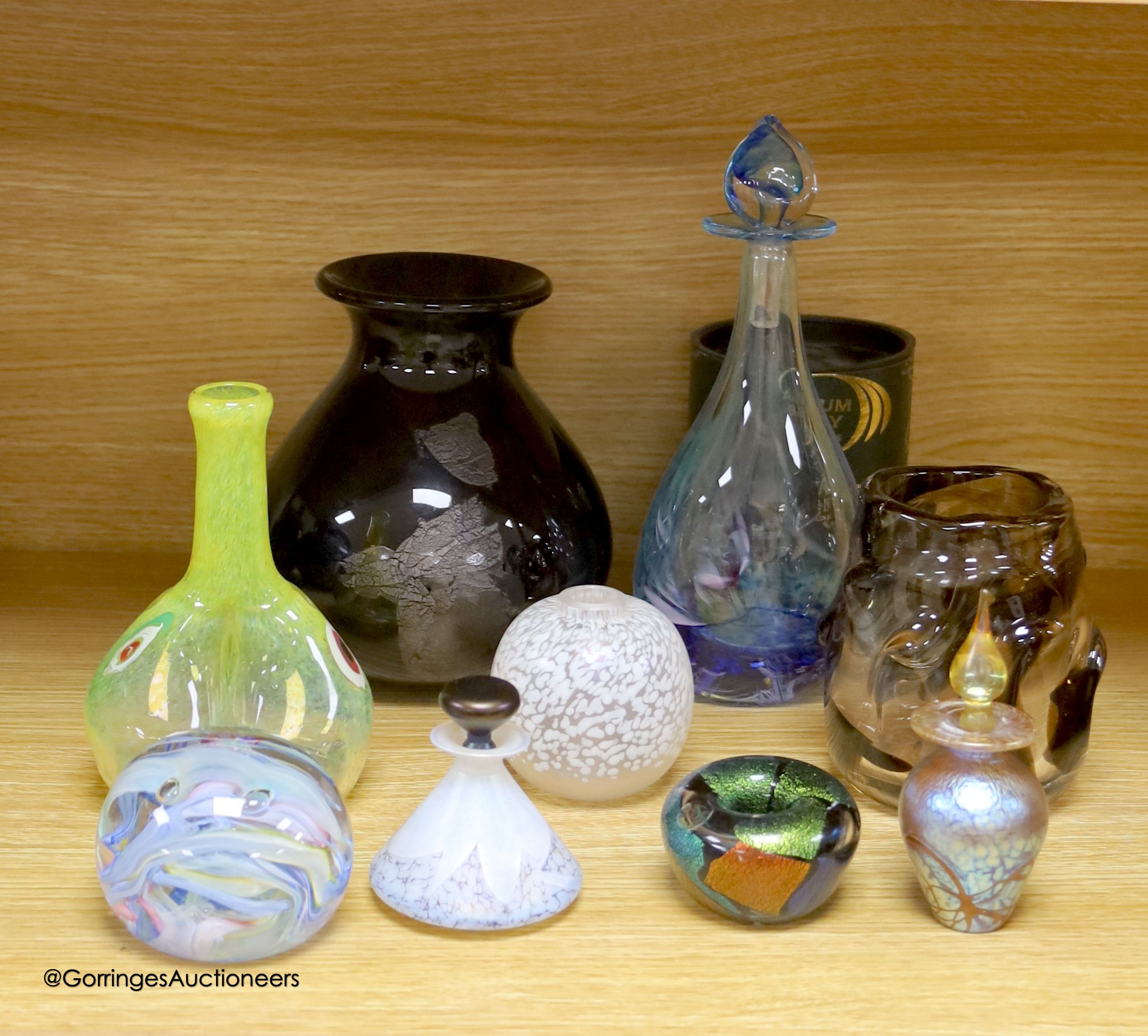 A collection of mixed studio glass