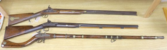 An Indian percussion rifle, an Afghan percussion rifle and a European percussion rifle, longest