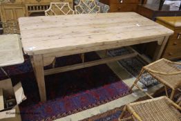 A 19th century rectangular pine plank top farmhouse kitchen table, length 211cm, depth 98cm, height