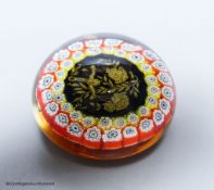 A 20th century Italian glass millefiore paperweight